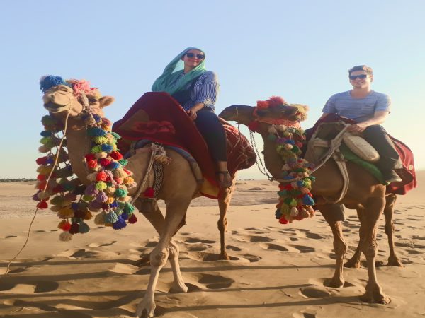 Tourists riding camels across golden sand dunes in Bafgh Desert, Yazd Province | Iran&rsquo;s Travel