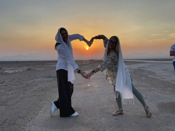 Mesr Desert at sunrise with golden light casting long shadows over the dunes | Iran&rsquo;s Travel